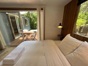 Maisons de vacances SUPERBE BUNGALOW*JACUZZI*JARDIN*CLIM*WIFI*PARKING : photos des chambres