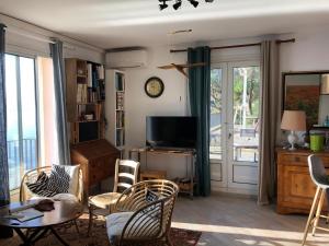 Appartements Une grande terrasse sur la mer : photos des chambres