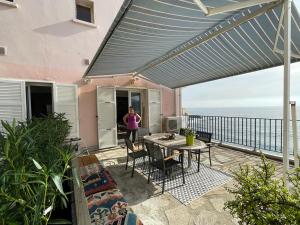 Appartements Une grande terrasse sur la mer : photos des chambres