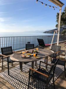 Appartements Une grande terrasse sur la mer : photos des chambres