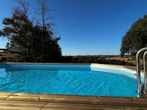 Maisons de vacances Gite a la ferme avec jacuzzi et piscine chauffee : photos des chambres