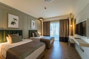 Bali Deluxe Villa with Private Pool (3 Adults + 2 Children) room in IC Hotels Residence