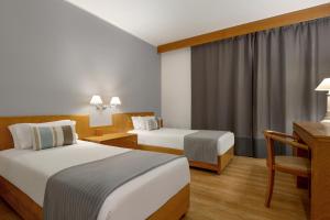 Twin Room - Disability Access room in TRYP Montijo Parque Hotel