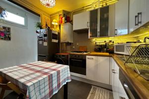 Appartements T3 with the charm of the old located in a residential area of Tours : photos des chambres