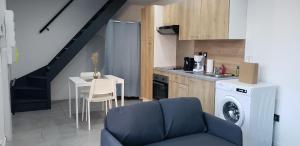 Appartements La Plume d'Or - Wifi - Parking Prive : photos des chambres