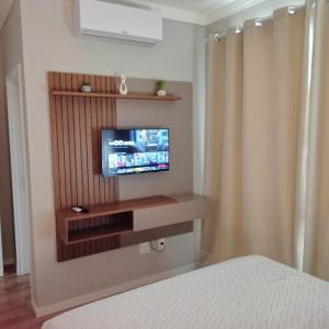 Linda casa com jacuzzi e churrasqueira privada para temporada