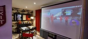 Maisons de vacances Appartement Cinema video-projecteur et garage : photos des chambres