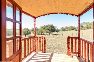 Maisons de vacances Roulotte La Comtoise : photos des chambres