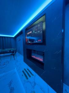 Maisons de vacances Suite cinema et jacuzzi prive : photos des chambres