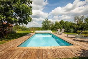 Maisons de vacances Les Trigones du Causse -Maison atypique avec Piscine Privee : photos des chambres