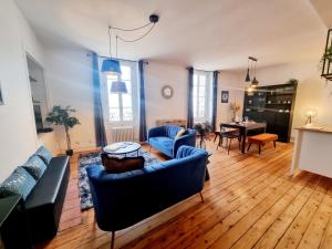 Appartements Grand T3 rue pietonne bureau et terrasse : photos des chambres