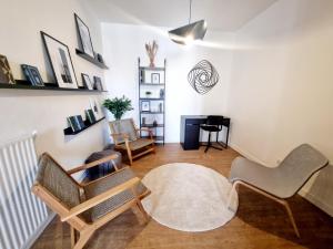 Appartements Grand T3 rue pietonne bureau et terrasse : photos des chambres