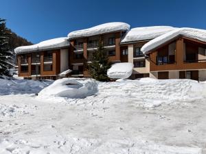 Duplex élégant à Val-dIsère : Wifi, parking couvert, proche commodités et navette - FR-1-694-61