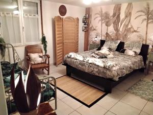B&B / Chambres d'hotes O tour du monde : photos des chambres