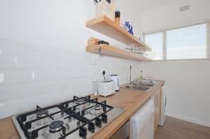 13 on Main Beach Flat