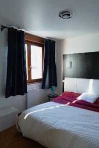 Appartements KASA JURA - Au coeur des monts : photos des chambres