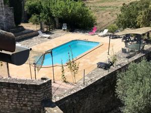 Maisons de vacances Propriete de 2 chambres avec piscine partagee et jardin clos a Orgnac l'Aven : photos des chambres