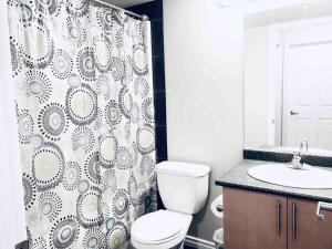 2 BDRM AC Condo wEnsuite Laundry + Free Parking