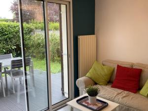 Appartements Charmant Cottage 2P avec Jardin et WIFI, a 2 Pas de la Plage de Cabourg - FR-1-487-285 : photos des chambres