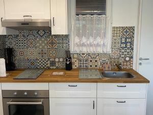 Appartements Charmant Cottage 2P avec Jardin et WIFI, a 2 Pas de la Plage de Cabourg - FR-1-487-285 : photos des chambres