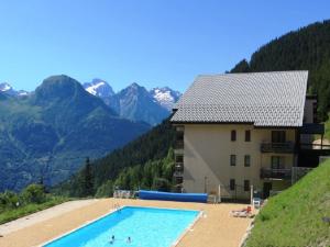 Maisons de vacances Appartement 4 pieces, 8 couchages a 300m des pistes - Auris en Oisans - FR-1-297-46 : photos des chambres
