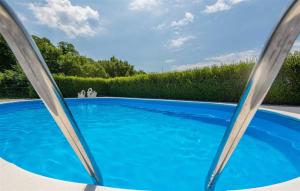 Holiday Home Flora with pool