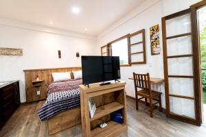 Casa Lucas - loft espaçoso com jardim e churrasqueira