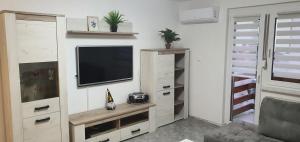Apartma Sivi žako 