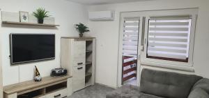 Apartma Sivi žako 