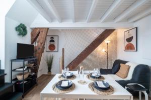 Appartements Le Ptit Helios : photos des chambres