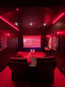 Maisons de vacances Suite cinema et jacuzzi prive : photos des chambres