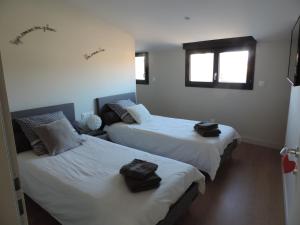 Appartements Agreable maison de village avec garage & terrasse : photos des chambres