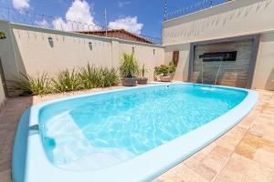 Incrível casa na praia de Camurupim por Carpediem