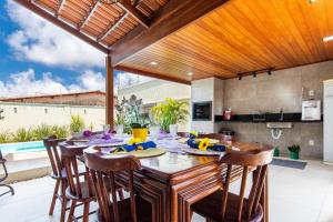 Incrível casa na praia de Camurupim por Carpediem