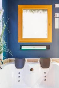 Appartements JADE Hammam & Jacuzzi : photos des chambres