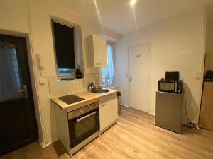 Appartements Le puits du bourg : photos des chambres