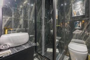 Appartements Le Musee d’Aphrodite / JACUZZI : photos des chambres