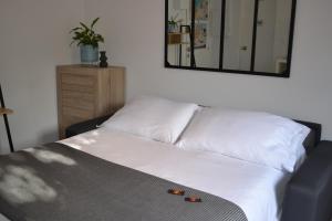 APPARTEMENT FACE À LA PLAGE Terrasse-Garage-Wifi-Draps et Serviettes