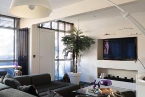 Appartements L’instant Cosy by GiMi : photos des chambres