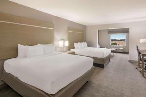 Queen Suite with Two Queen Beds and Sofa Bed room in Best Western Plus Killeen/Fort Hood Hotel & Suites