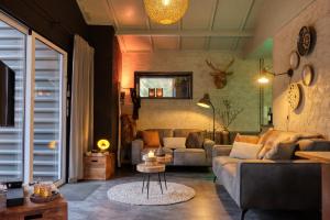 Lodge in een bosrijke omgeving met Hottub & Sauna opt