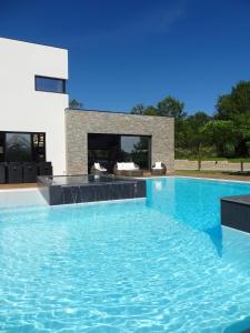 Villas Luxueux Domaine Dal Cayrou grande piscine Cahors : photos des chambres