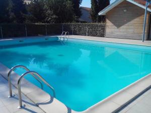 Appartements Biscarrosse T2 avec piscine, parking, a 10km de l'ocean - FR-1-319-349 : photos des chambres