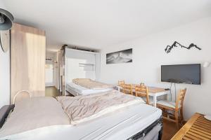 Chaleureux studio à Anzère, accessible à ski, proche de tout