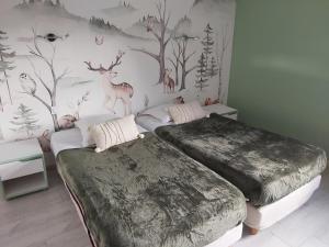 Maisons de vacances Au Pres du Zoo : photos des chambres