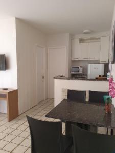 Apartamento a 140 metros da Praia, e Piscina na Cobertura do Prédio