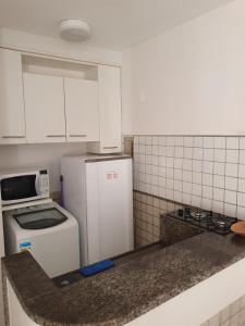 Apartamento a 140 metros da Praia, e Piscina na Cobertura do Prédio