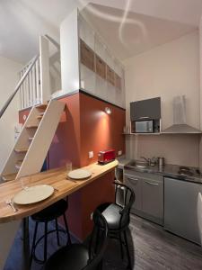 Appartements Cosy studio en mezzanine wifi hyper centre : photos des chambres