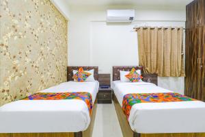 FabHotel E City Inn - 3km from Infosys Campus