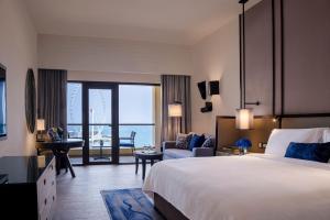 Sea View Room with Balcony - King Bed  room in Amwaj Rotana Jumeirah Beach - Dubai